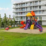 Apartment Blue And Beige In With Seasonal Pool, Parking And Balcony By Renters