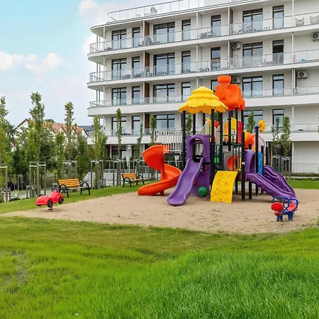 Apartment Blue And Beige In With Seasonal Pool, Parking And Balcony By Renters